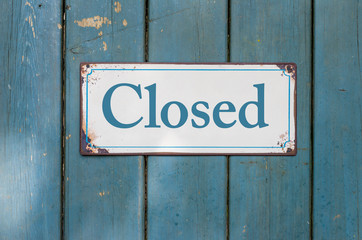 Old sign with the inscription Closed