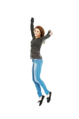 Young casual woman, student jumping.