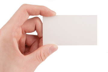 Hand holding a blank business card isolated on white