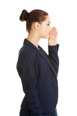 Businesswoman talking gossip