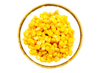 Sweet corn on the bowl on a white background seen from above