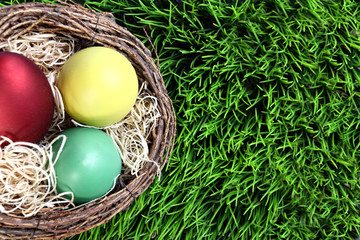 Colorful Easter eggs in the nest