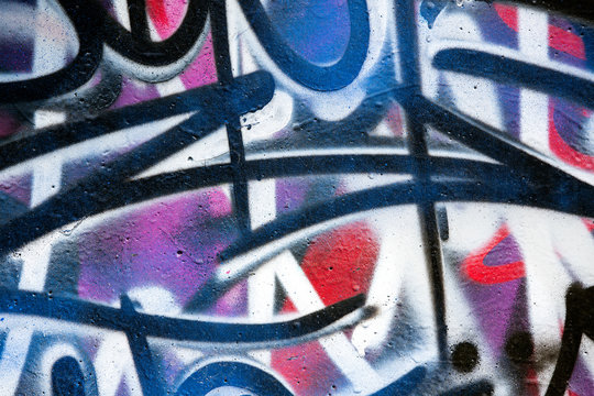 Fototapeta Wall covered with graffiti