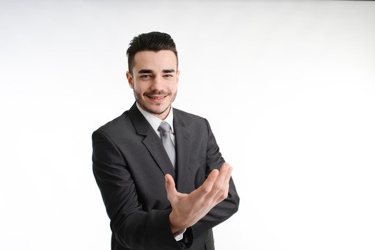 isolated young business man positive attitude