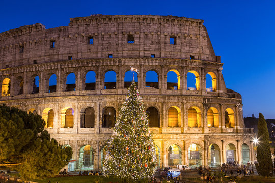 Fototapeta Colosseum in Rome at Christmas during sunset, Italy