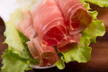smoked speck prosciutto - selective focus