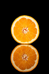.Orange fruit isolated on a black background