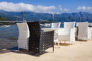 coastal cafe tables on the sea