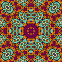 Indian mandala in red and green color. Vintage tribal wallpaper