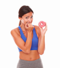 Sporty adult woman holding tempting food