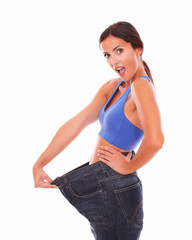 Beautiful lady feeling happy with weight loss