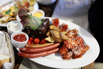 Plate with sausages and vegetables
