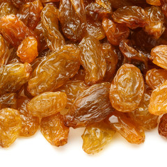 Yellow sultanas raisins isolated on white background cutout