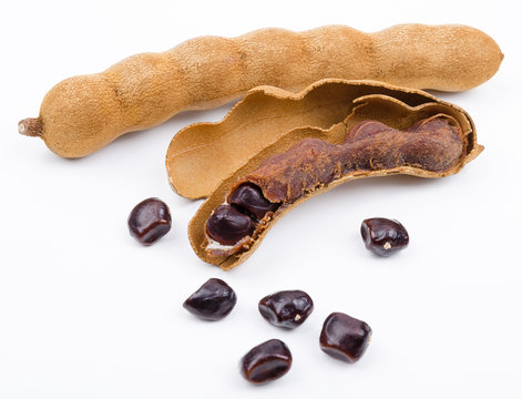 Dried Tamarind Fruits With Seeds On White Background
