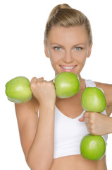 woman involved in fitness dumbbells of apples