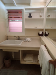 Inside Cottage Bathroom with Mirror and sink