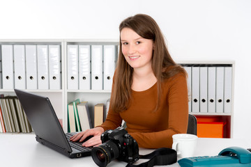 young reporter in editorial office