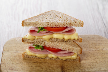 toast sandwich with ham cheese and tomato