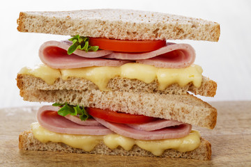 toast sandwich with ham cheese and tomato