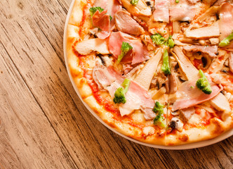 pizza on wooden background