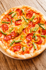pizza on wooden background