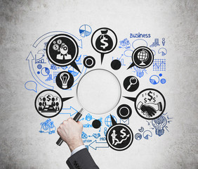 magnifier with business icons