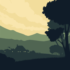 Silhouette landscape with a farm on a background of mountains