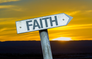 Faith sign with a sunset background