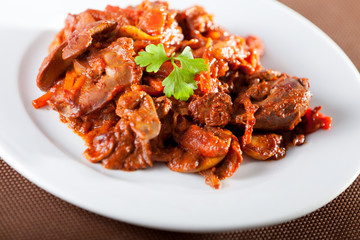 Chicken livers with tomato sauce
