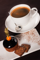 Beautifully decorated dessert with a cup of coffee