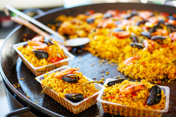 Fresh paella prepared on street market