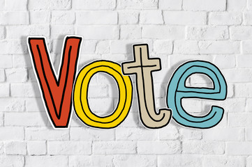 The Word Vote on a Brick Wall