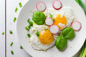 Fried eggs shape hearts Valentines dish