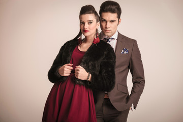 Elegant young woman leaning on her lover