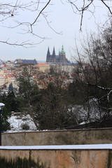 First Snow in Prague City with gothic Castle, Czech Republic
