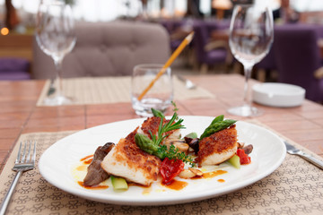 Fish fillet with mushrooms and asparagus
