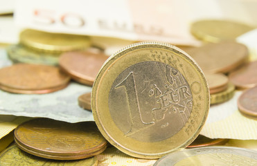 one euro coin , money background