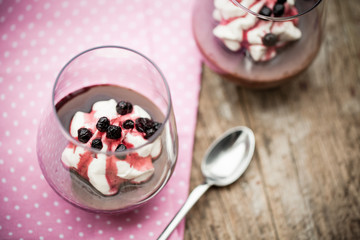 Chocolate pudding with whipped coconut cream