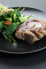 Roasted lamb with rocket, lettuce, sprout and chili salad.