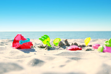 toys on the sand seashore