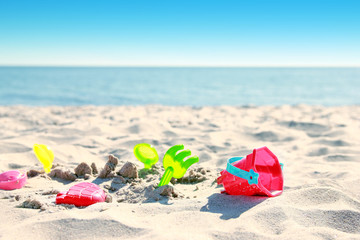toys on the sand seashore