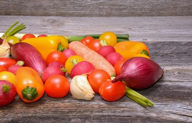 Vegetables on old wooden background