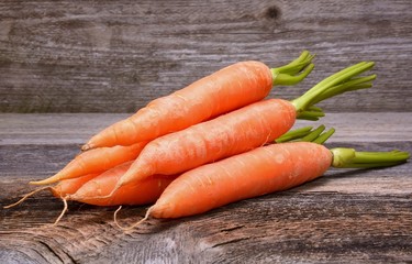 Carrots on wooden table