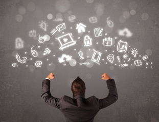 Business man looking at modern icons and symbols