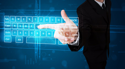 Businessman pressing virtual type of keyboard