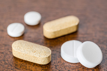 Cure the disease, take the pills and vitamins on the table