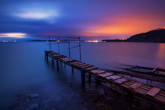 Long time exposure landscape with lake after sunset