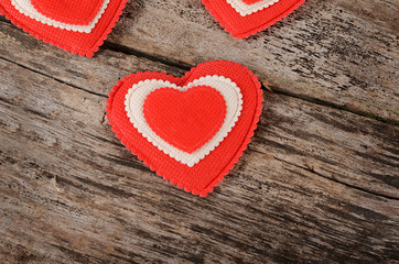 Hearts on wooden background. Valentine's day