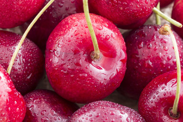 Heart shaped cherry isolated on white background