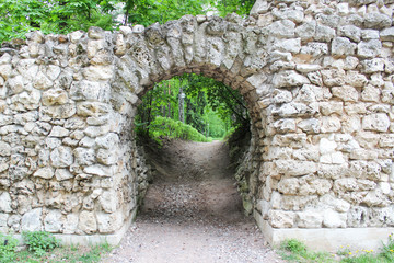 The road through the stone archway